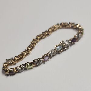 Sterling Silver Gemstone Bracelet Including Peridot, Garnet, Topaz, Amethyst